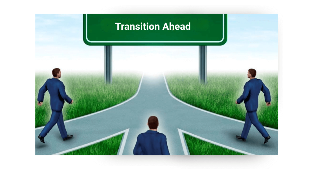 Three businessmen walking toward a green 'Transition Ahead' road sign on a forked path through a grassy field under a clear sky.